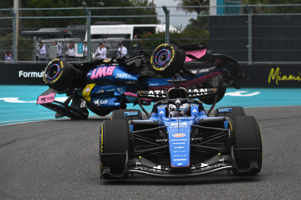 MIAMI, FLORIDA - MAY 03: Alexander Albon of Thailand driving the (23) Williams FW48 Mercedes leads as Pierre Gasly of France driving the (10) Alpine F1 A526 Mercedes crashes during the F1 Grand Prix of Miami at Miami International Autodrome on May 03, 2026 in Miami, Florida. (Photo by Rudy Carezzevoli/Getty Images)