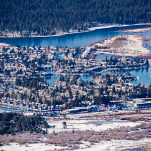 Aerial view of a residential area in South Lake Tahoe, with houses built on the shores of man made canals, California; sunny winter day.