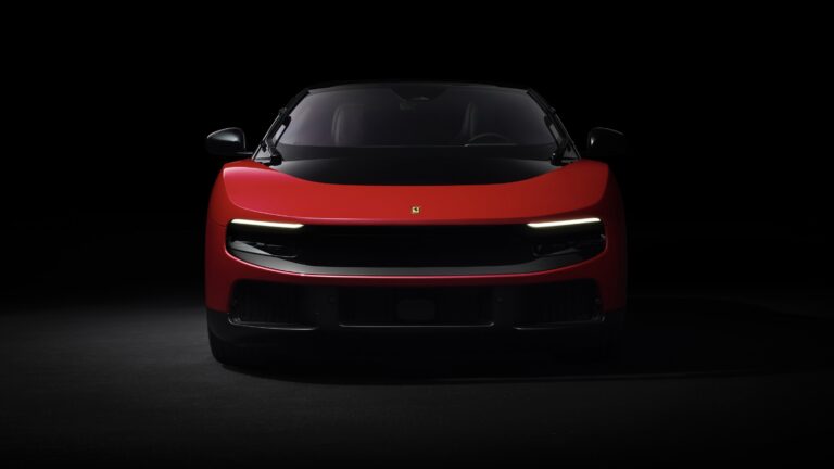 A red Ferrari Luce, head-on