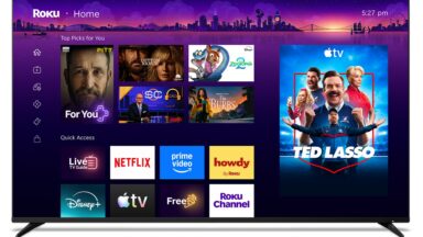 A TV displaying the new Roku home screen