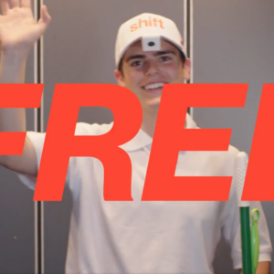 A person wearing a white hat with the word "Shift" and a camera attached to the hat brim is waving and smiling while holding a cleaning mop and Swiffer. The word "Free" in big red letters is in the foreground.
