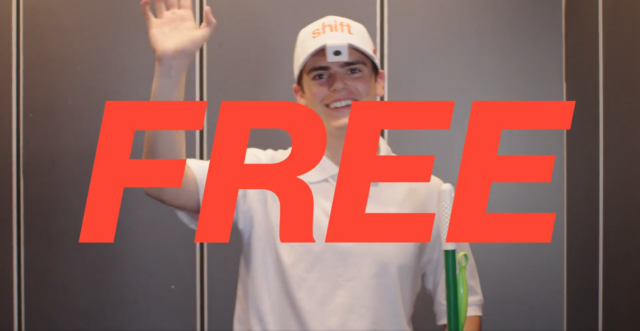 A person wearing a white hat with the word "Shift" and a camera attached to the hat brim is waving and smiling while holding a cleaning mop and Swiffer. The word "Free" in big red letters is in the foreground.