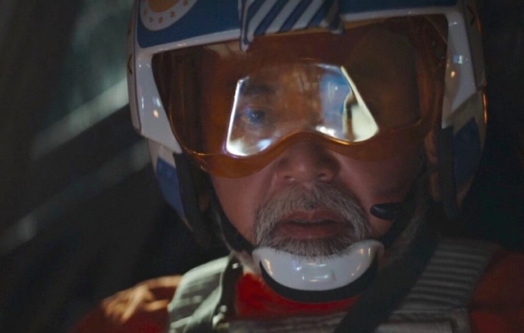 closeup of Rebel pilot with visor in a spacecraft