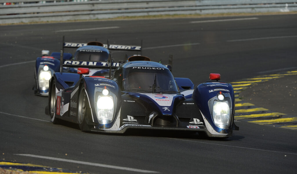 LE MANS, FRANCE - JUNE 11: The #9 Team Peugeot Total Peugeot 908 Sebastien Bourdais of France, Simon Pagenaud of France, and Pedro Lamy of Portugal, during the 79th running of the Le Mans 24 Hour race at the Circuit des 24 Heures du Mans on June 11, 2011 in Le Mans, France (Photo by Rick Dole/Getty Images)