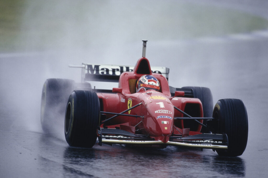 Michael Schumacher from Germany drives the #1 Scuderia Ferrari Ferrari F310 Ferrari V10 in the rain during the Formula One Spanish Grand Prix on 2nd June 1996 at the Circuit de Barcelona-Catalunya, Barcelona, Spain. (Photo by Pascal Rondeau/Allsport/Getty Images