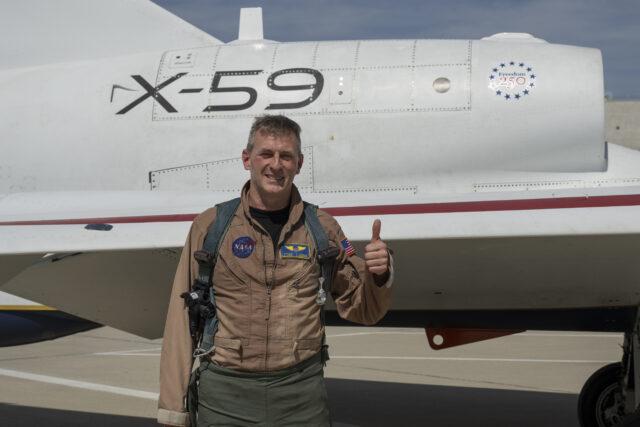 NASA test pilot Jim “Clue” Less is seen giving a thumbs up after completing his first flight of the X-59 and the aircraft’s second flight overall at Edwards Air Force Base in California on Thursday, March 26, 2026.
