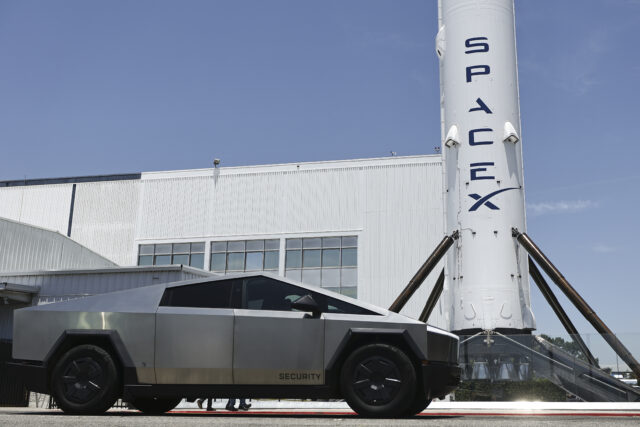 SpaceX signage outside the Space Exploration Technologies Corp. facility in Hawthorne, California, on June 3, 2026. A Tesla Cybertruck sits in the foreground.
