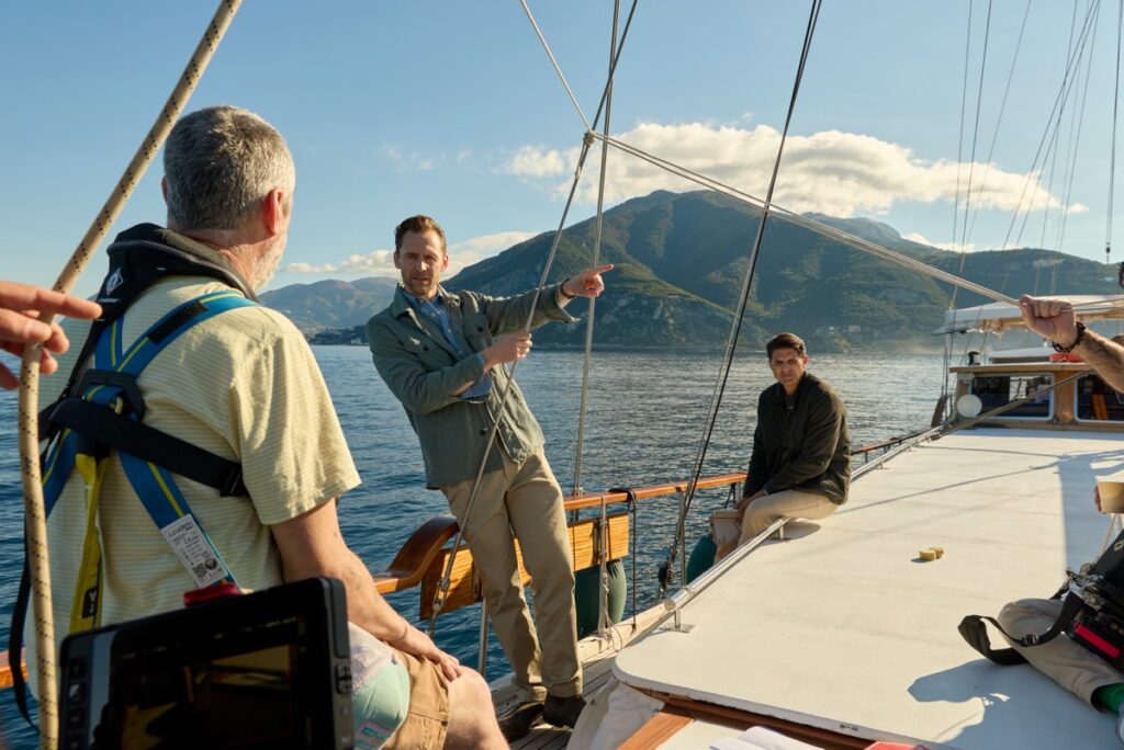 Hiddleston with Dr. Darius Arya in the Gulf of Naples, behind-the-scenes