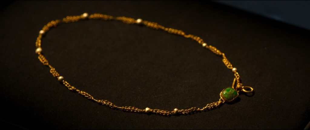 A gold and jeweled necklace, discovered on the remains of an adult woman presumed to be Julia Felix, in the artifacts vault at Pompeii Archaeological Park.