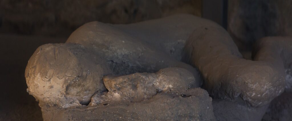 Plaster casts of the victims from the eruption of Vesuvius, on display at Pompeii Archaeological Park.