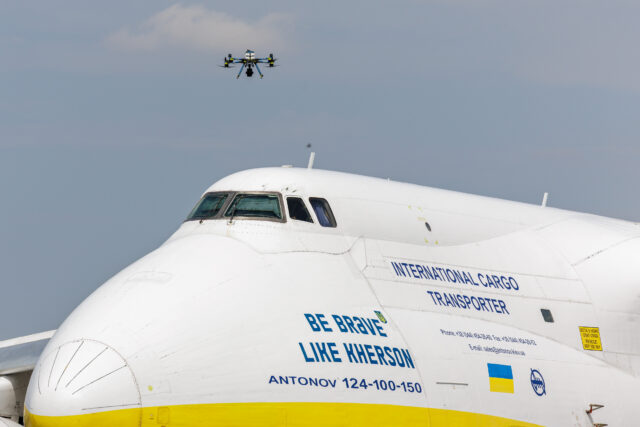 A police drone takes off next to Ukrainian Antonov cargo plane at Leipzig/Halle Airport in Germany on August 5, 2026. Airport workers reportedly discovered a drone yesterday on the tarmac near an Antonov at the airport that was equipped with an explosives detonator and an unidentified substance. Additionally, a DHL cargo plane that took off from the airport late last night collided with a small object, causing minor damage.