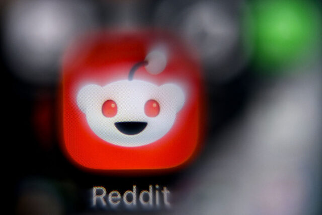 the logo of Reddit on a smartphone screen
