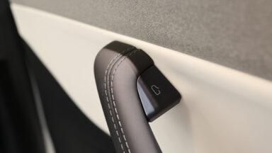 The interior door handle of a Tesla Model 3 electric vehicle at a pop-up Tesla Inc. store on its opening day in Riga, Latvia, on Friday, Aug. 21, 2026. Tesla Inc. and at least eight other carmakers are recalling millions of cars in China over safety concerns with their door handles. Photographer: Andrey Rudakov/Bloomberg via Getty Images