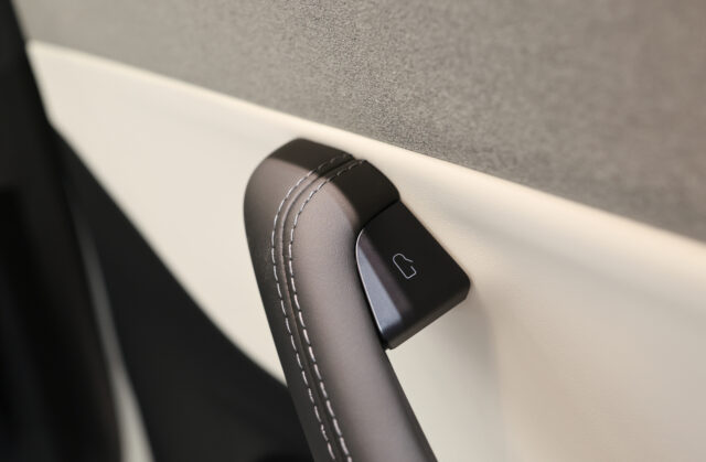 The interior door handle of a Tesla Model 3 electric vehicle at a pop-up Tesla Inc. store on its opening day in Riga, Latvia, on Friday, Aug. 21, 2026. Tesla Inc. and at least eight other carmakers are recalling millions of cars in China over safety concerns with their door handles. Photographer: Andrey Rudakov/Bloomberg via Getty Images