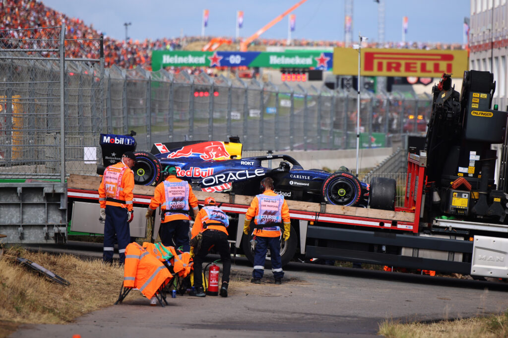 ZANDVOORT, NETHERLANDS - AUGUST 23: Marshals remove the damaged car pf Max Verstappen of the Netherlands and Oracle Red Bull Racing with a truck prior to the F1 Grand Prix of Netherlands at Circuit Zandvoort on August 23, 2026 in Zandvoort, Netherlands. (Photo by Anni Graf - Formula 1/Formula 1 via Getty Images)