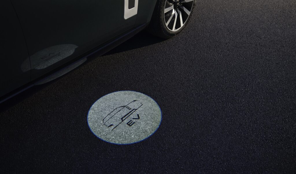 A Range Rover EV puddle light