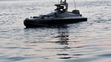 A drone boat loaded with explosives found near Romania's Neptun Deep gas project in the Black Sea. The uncrewed surface vessel is painted black.