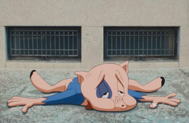 cartoon pig laying on pavement after a fall with a black eye and looking in pain