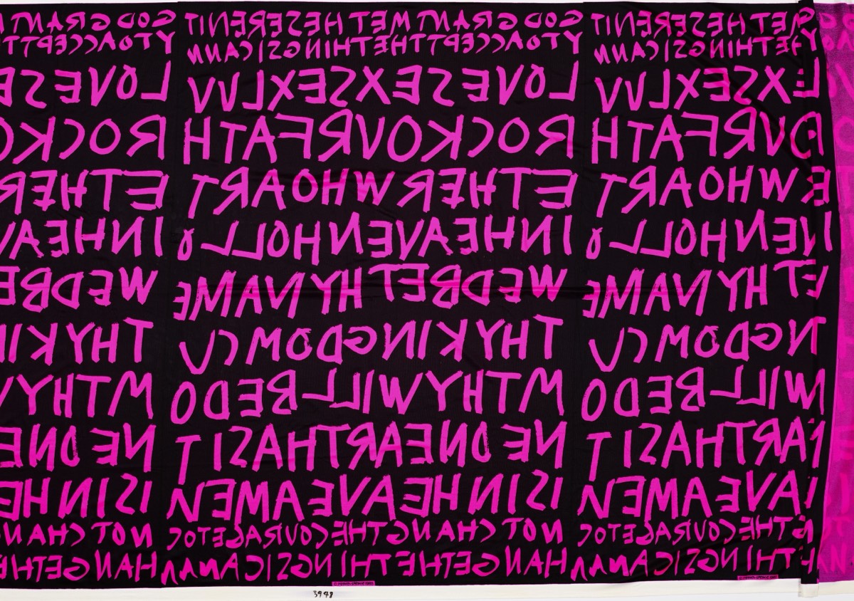 A swath of spandex fabric with DayGlo pink graffiti designed by Stephen Sprouse.
