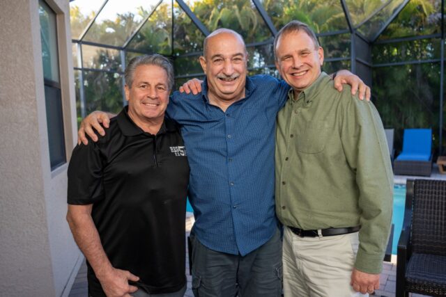 Scott Fox, John McLoughlin, and John Busching pose together during their reunion. McLoughlin was trapped in the rubble of the World Trade Center for 22 hours after 9/11, and Busching and Fox were two of the people who helped rescue him.