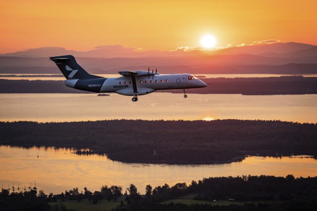 Heart Aerospace's X1 demonstrator aircraft flies over lakes and forest set against the rising sun near Plattsburgh International Airport in upstate New York on August 12.