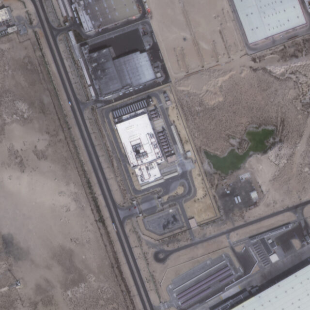 A Planet Labs satellite image shows a top-down view of an Amazon data center in Abu Dhabi, UAE, on March 2, 2026. This data center was damaged by an Iranian drone strike.