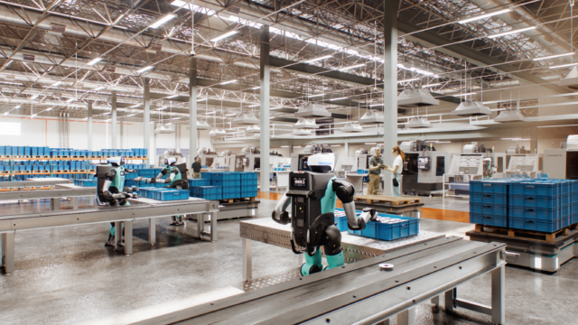 Agility's Digit 5 robots are designed to safely work near humans. The image shows the humanoid robots standing at workstations in a warehouse as nearby humans converse.
