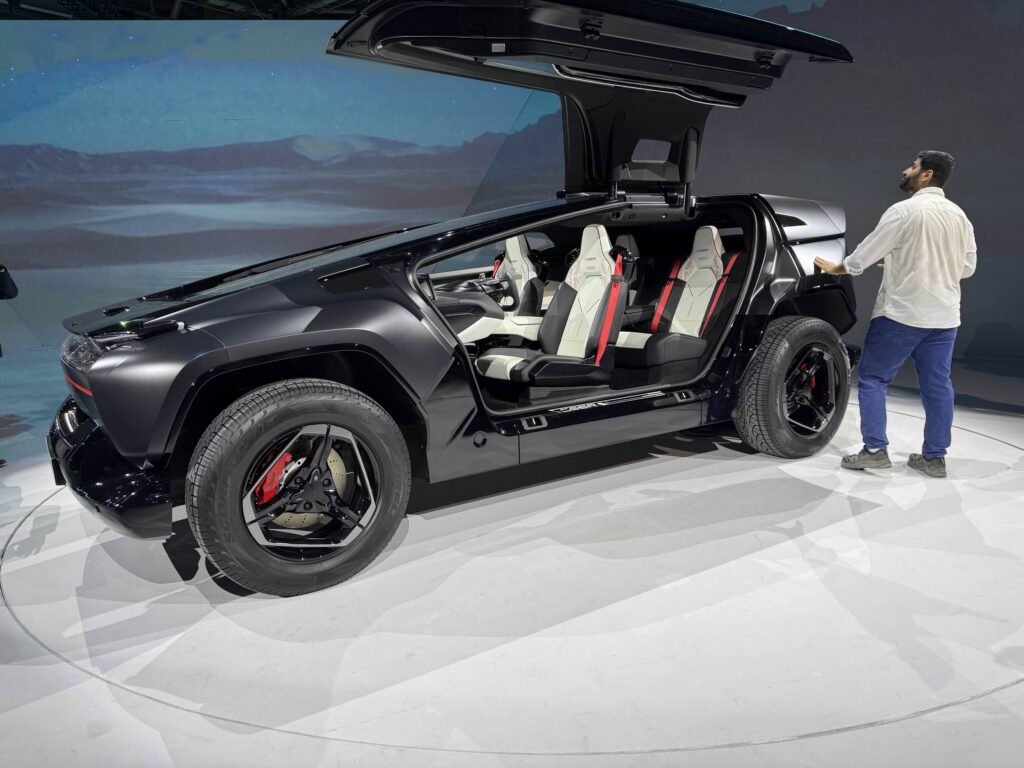 A Black Exobot SUV with the doors open