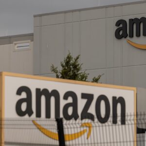 Amazon logos on the outside of one of the company's warehouses.