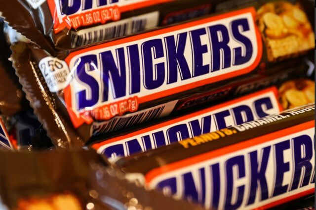 a row of Snickers candy bars