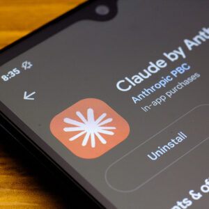 Photo of phone with Claude by Anthropic icon showing