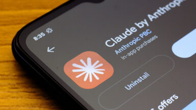 Photo of phone with Claude by Anthropic icon showing
