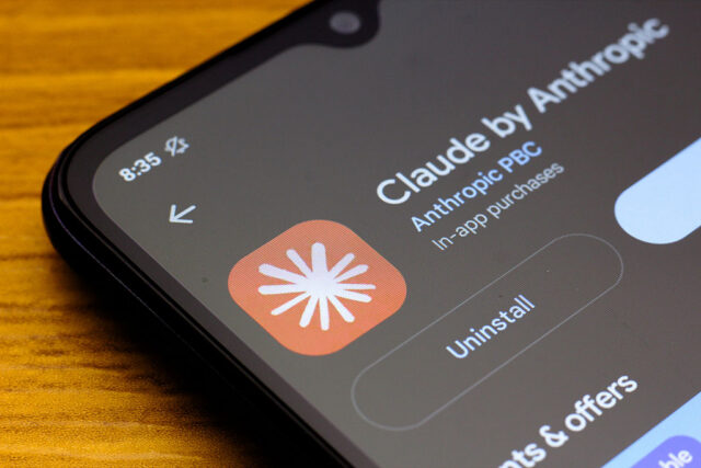Photo of phone with Claude by Anthropic icon showing