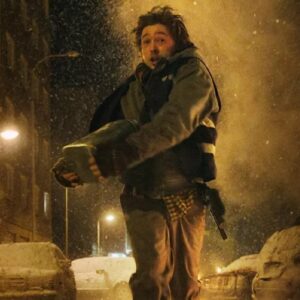 young man dressed as a courier running down a snowy street clutching a medical bag, looking terrified
