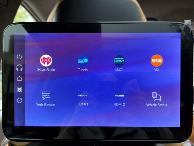 Cadillac Escalade IQ rear-seat entertainment screen showing streaming apps and a web browser