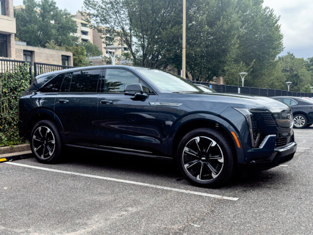 Cadillac Escalade IQ filling a parking