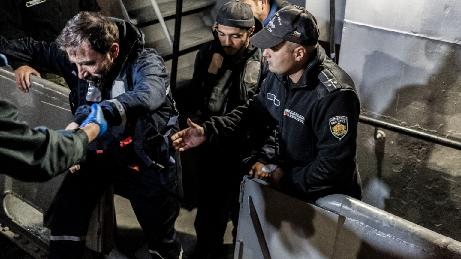 Rescued sailors from a ship attacked by a drone arrive at Varna port in Bulgaria on October 13, 2026.
