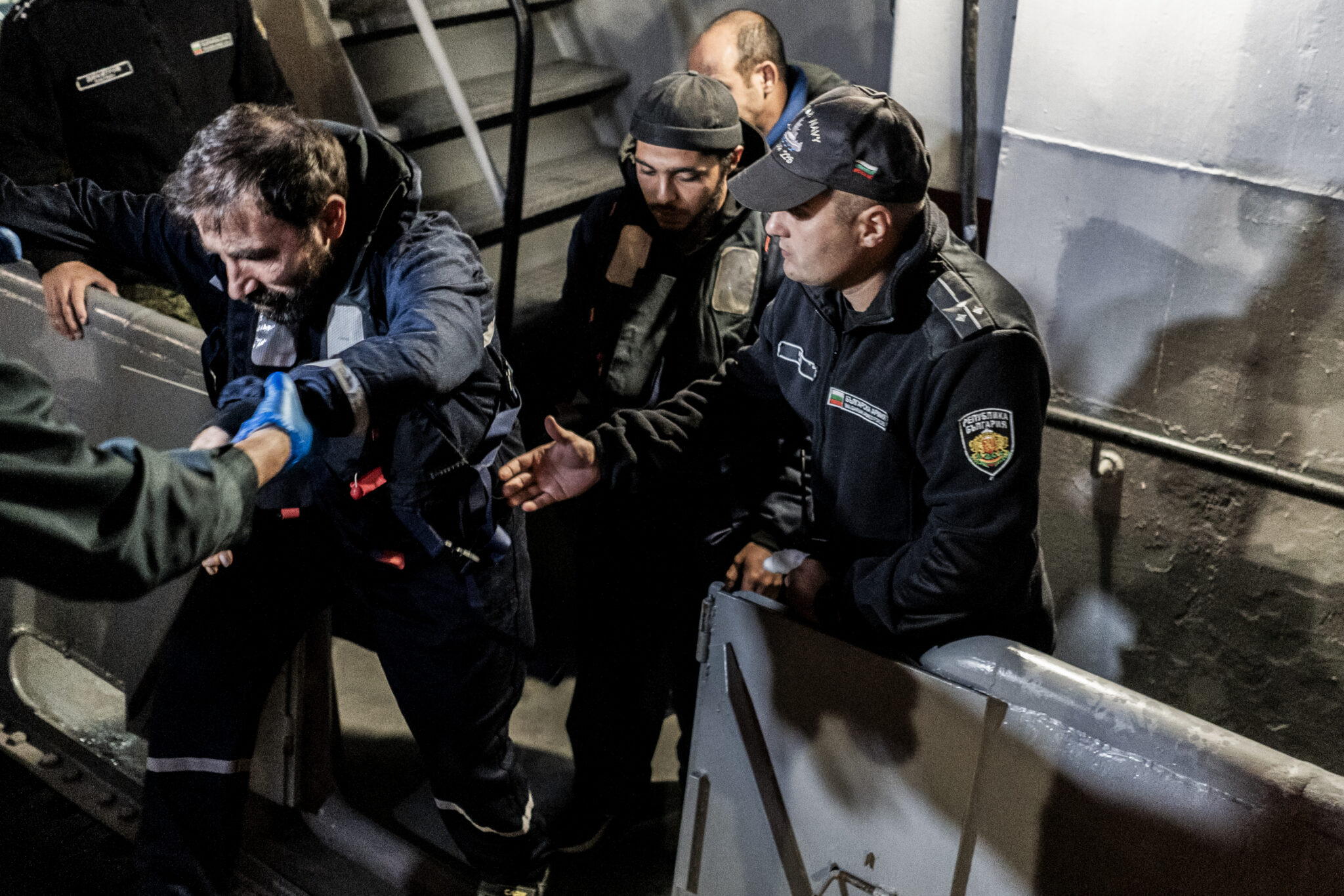 Rescued sailors from a ship attacked by a drone arrive at Varna port in Bulgaria on October 13, 2026.