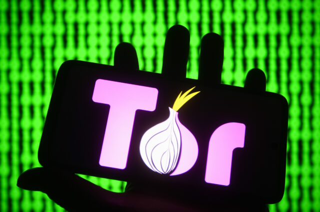 In this photo illustration, the logo of Tor Browser (The Onion Router), an open source software is seen displayed on a smartphone.