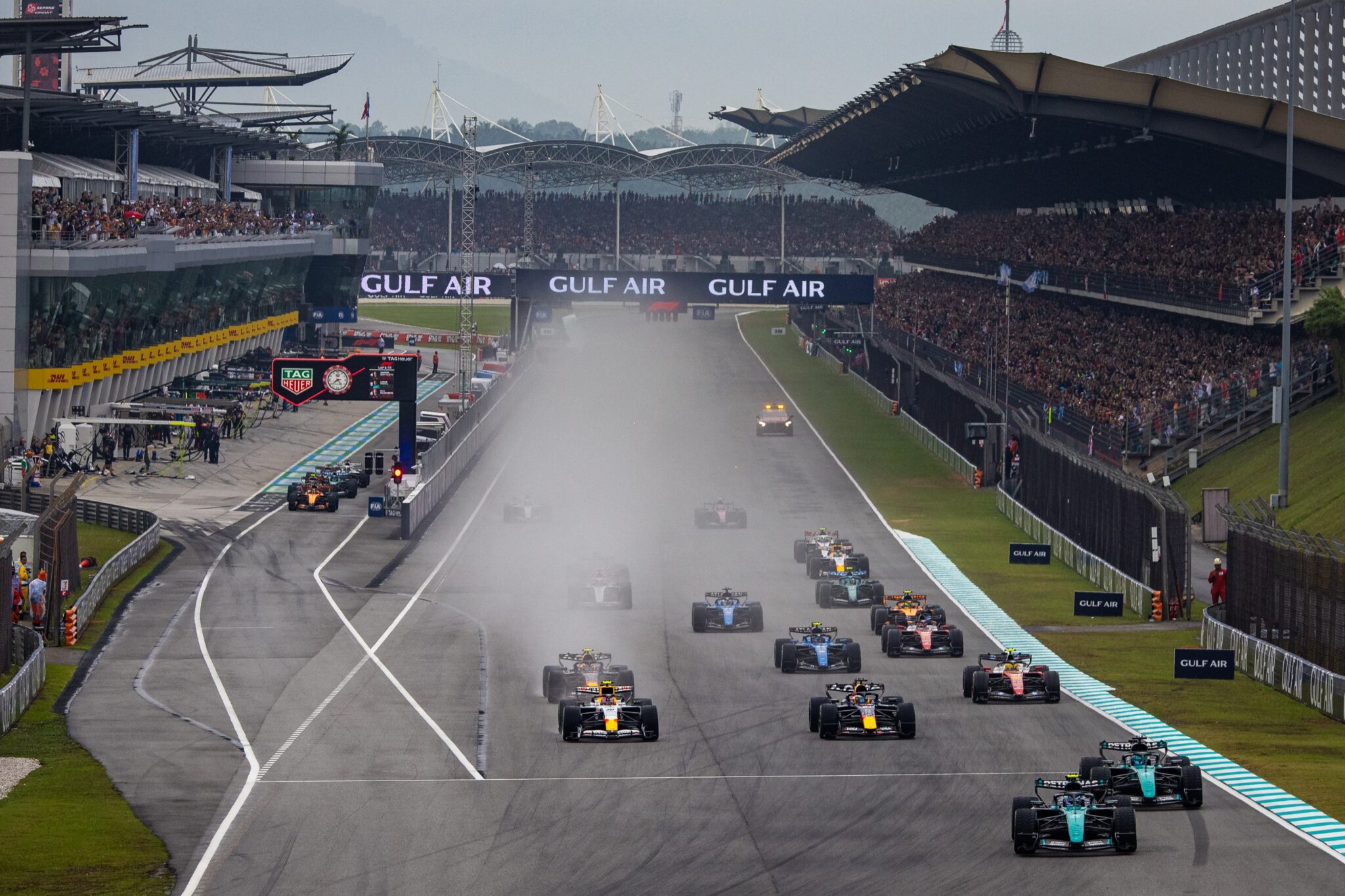 KUALA LUMPUR, MALAYSIA - OCTOBER 4: Andrea Kimi Antonelli of Italy driving the (12) Mercedes W17 on track leading the race withe the other cars following behind