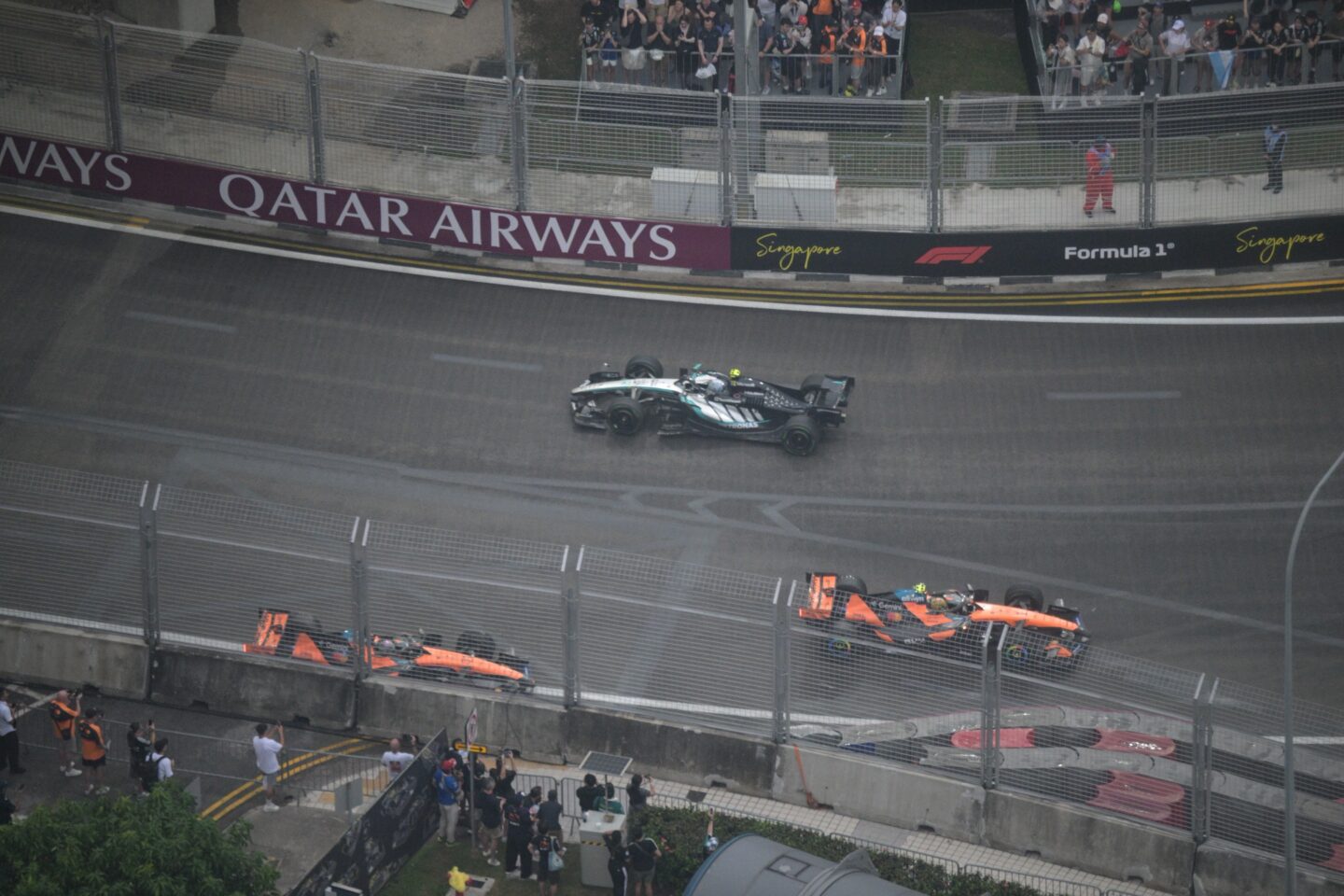 McLaren drivers Lando Norris R and Oscar Piastri L spin after colliding during the sprint of the Formula One Singapore Grand Prix at the Marina Bay Street Circuit, on Oct. 10, 2026. (Photo by Then Chih Wey/Xinhua via Getty Images)