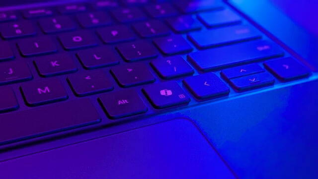 A macro shot of the Surface Laptop Ultra's keyboard shows the MS Copilot key