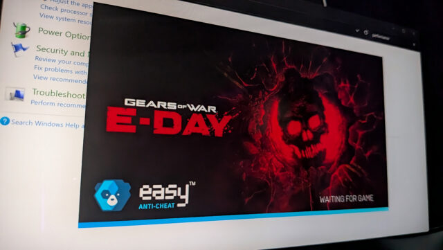 The Windows desktop shows a loading screen for Gears of War: E-Day, along with the Easy AntiCheat Logo