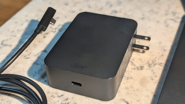 A view of the charging brick and magnetic charging cable of the Surface Laptop Ultra.
