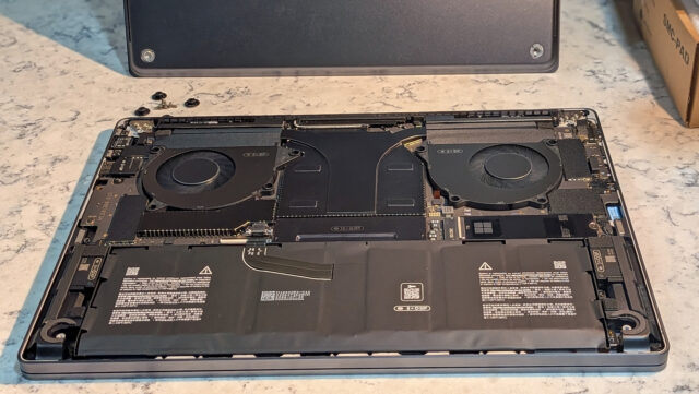 A full exposed view of the Surface Laptop Ultra with the underside cover removed.