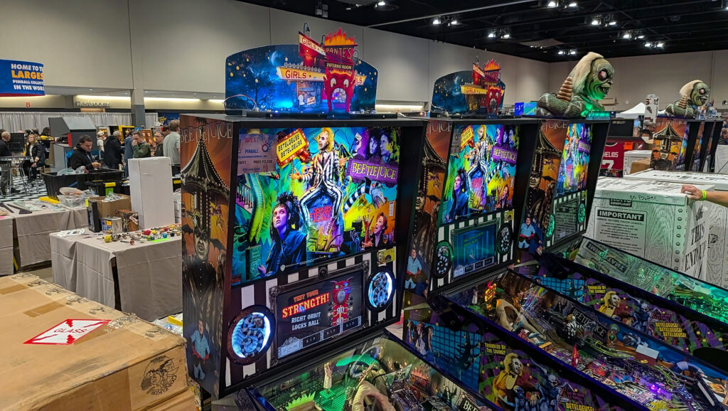 Three Beetlejuice pinball machines in a row