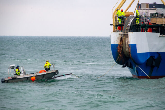 A fiber optic cable is pulled ashore from the cable-laying ship "Pleijel" at the entrance to the port of Sassnitz on the island of Rügen, Germany in November 2023.