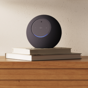 Amazon Echo Studio with Home Camera on a table