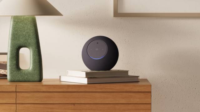 Amazon Echo Studio with Home Camera on a table