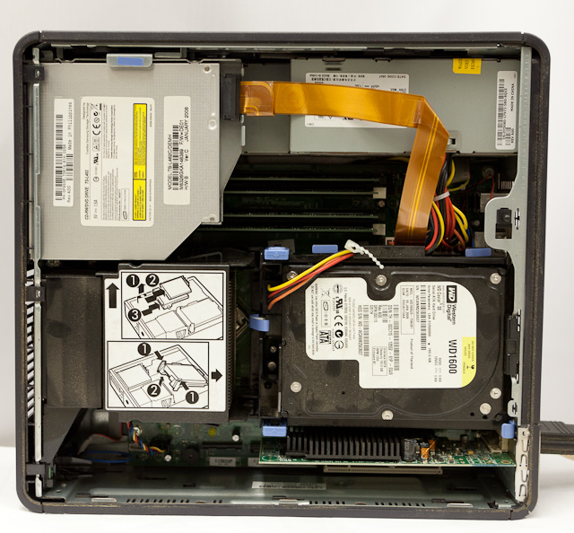 Small and tightly packed: it just barely fits a single hard disk, slim optical drive, and low-profile video card. (Dell Optiplex GX620 SFF)